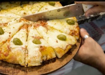 Búsqueda de fondos: el Club de Leones organizó una “pizza-lotería”